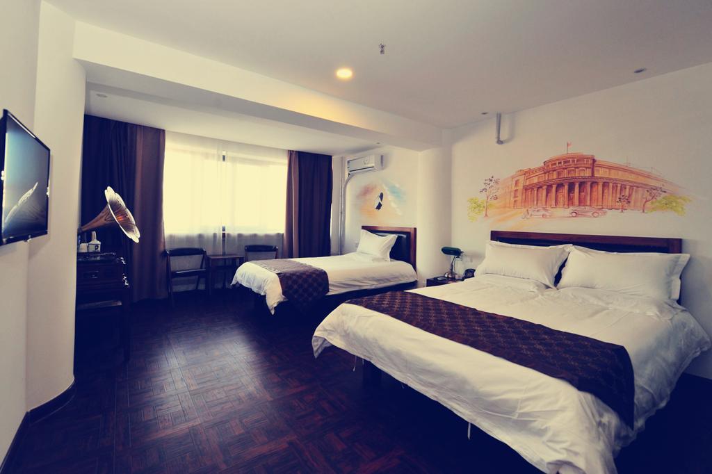Nostalgiahotel-Tianjinguozhancenter Chambre photo
