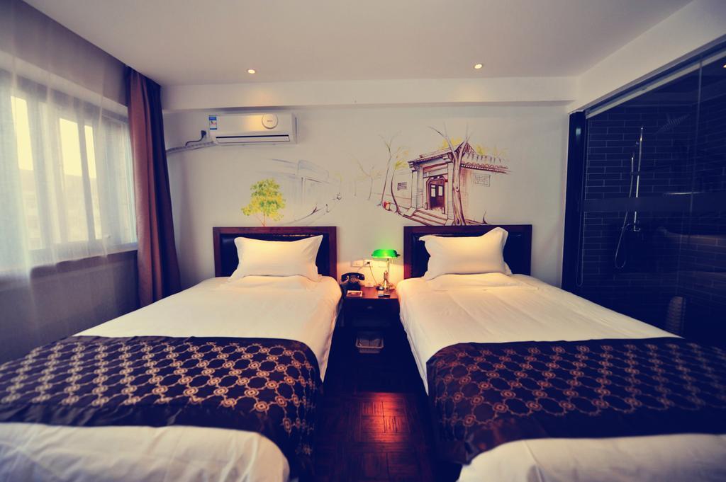 Nostalgiahotel-Tianjinguozhancenter Chambre photo